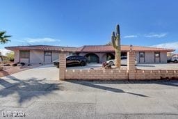 ranch-style house featuring a garage