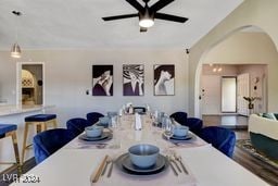 dining room featuring ceiling fan