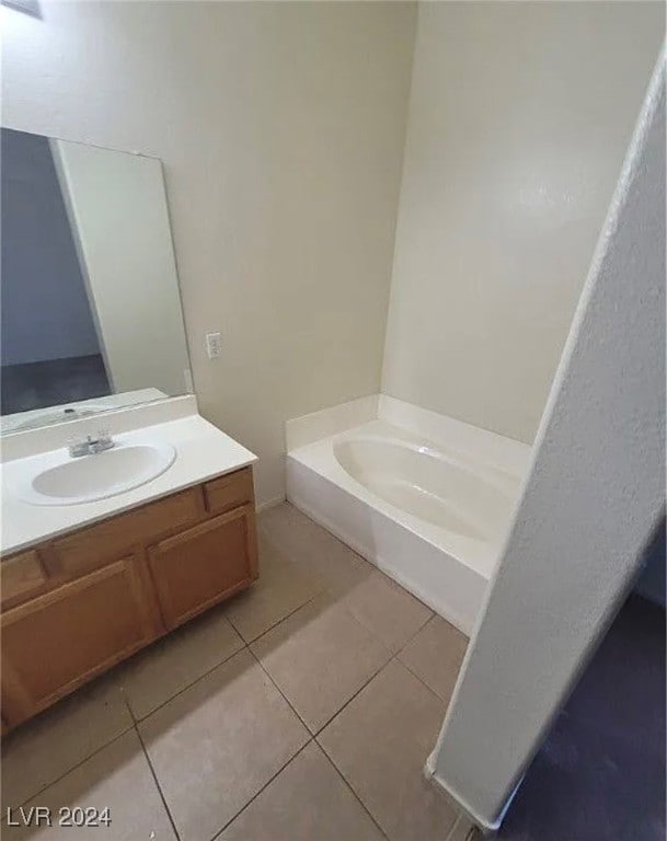 bathroom featuring vanity and tile patterned flooring