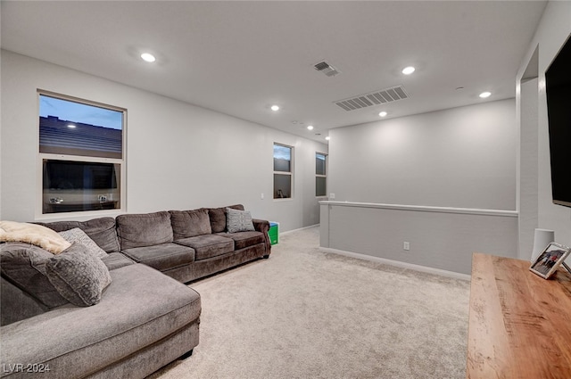 living room featuring light carpet