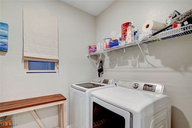 laundry room featuring washer and clothes dryer