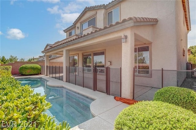 view of pool featuring a patio