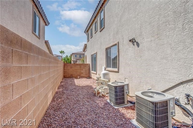 view of yard with central AC unit