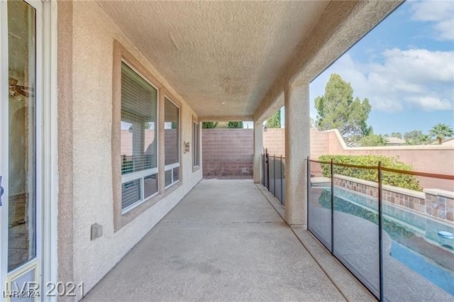 view of patio / terrace featuring a fenced in pool