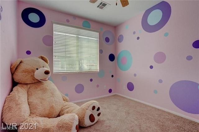 carpeted bedroom with ceiling fan