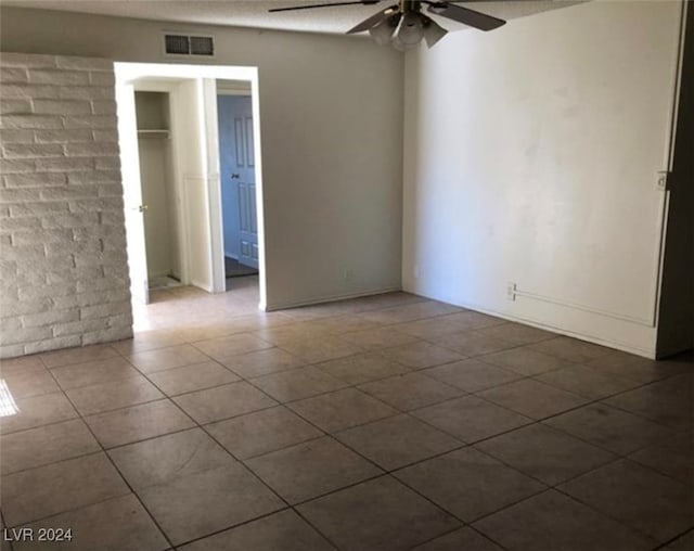 spare room featuring ceiling fan