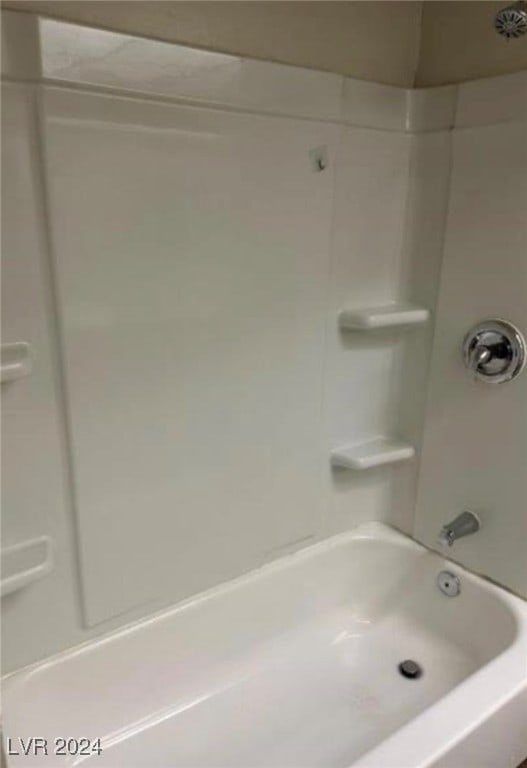 bathroom featuring shower / washtub combination