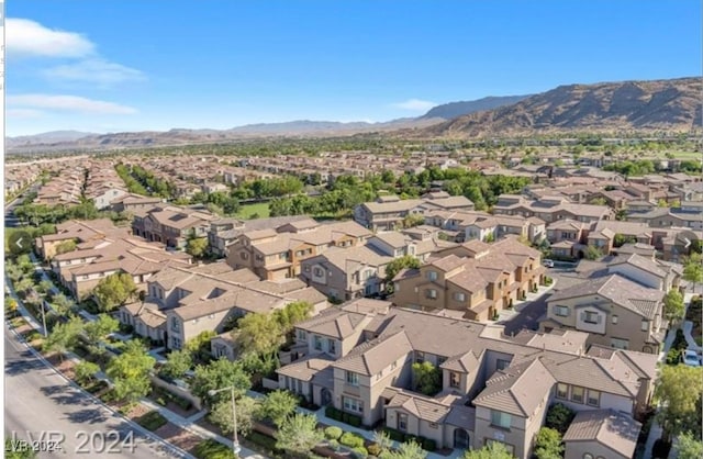 drone / aerial view featuring a mountain view