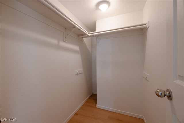 walk in closet featuring light wood-type flooring