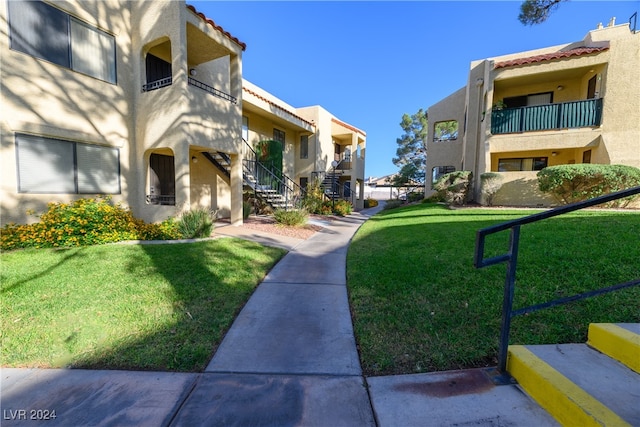 view of community featuring a lawn