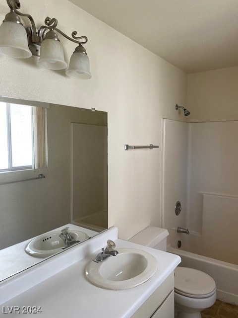 full bathroom featuring shower / tub combination, toilet, and vanity