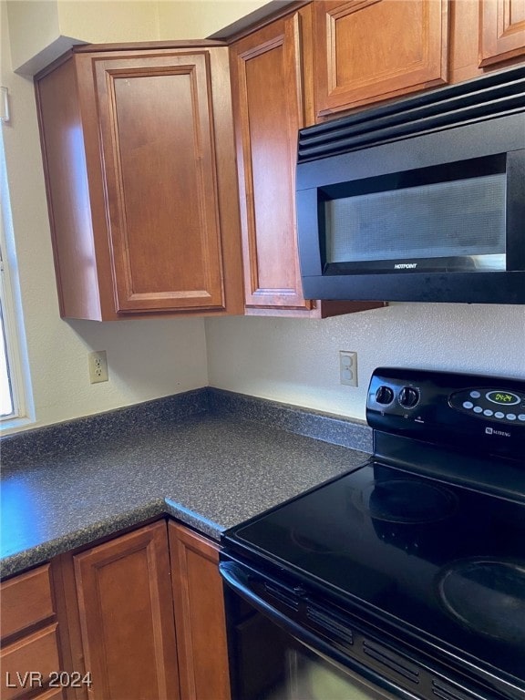 kitchen featuring black / electric stove