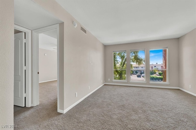 view of carpeted spare room