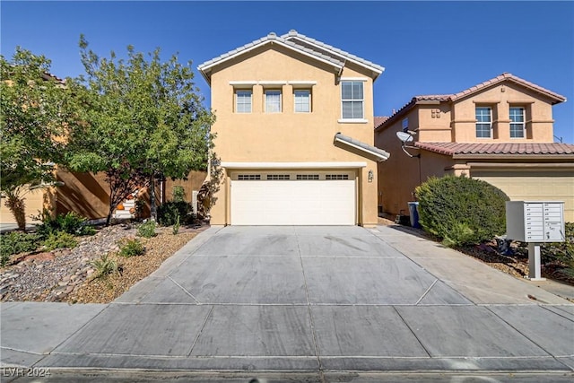 view of front of property with a garage