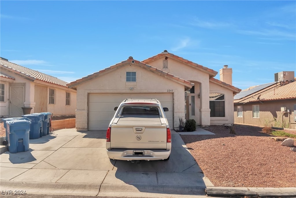 view of front of home with a garage