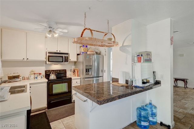 kitchen featuring ceiling fan, sink, kitchen peninsula, white cabinetry, and appliances with stainless steel finishes