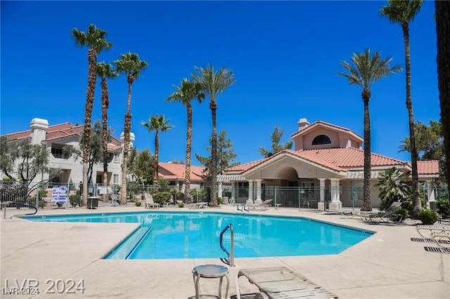 view of swimming pool with a patio