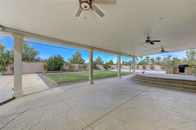 view of patio featuring ceiling fan