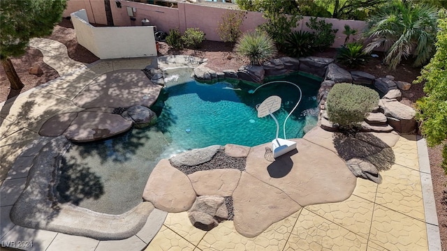 view of swimming pool featuring a patio