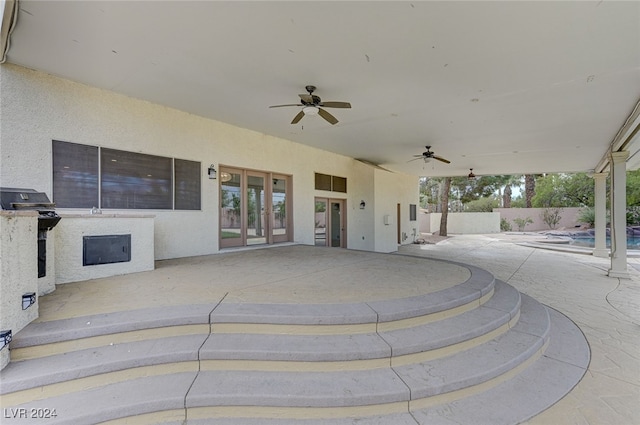 view of patio featuring a fenced in pool, french doors, grilling area, and ceiling fan