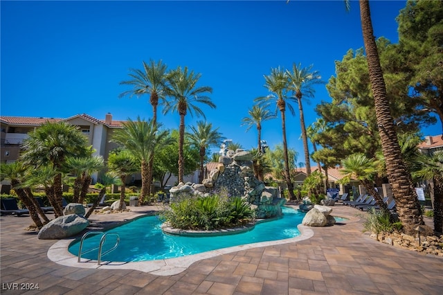 view of pool featuring a patio