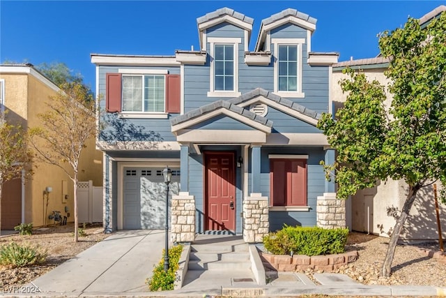 townhome / multi-family property featuring a garage