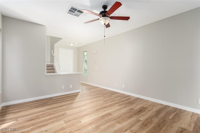 unfurnished living room with light hardwood / wood-style flooring and ceiling fan