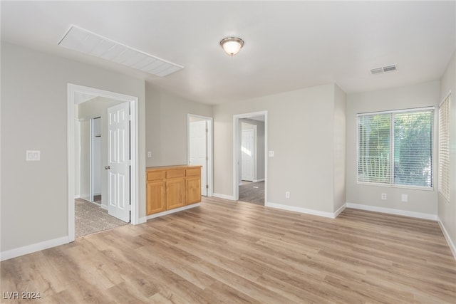 empty room featuring light hardwood / wood-style floors