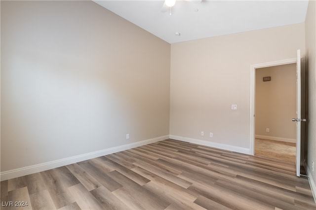 unfurnished room with light hardwood / wood-style floors and ceiling fan