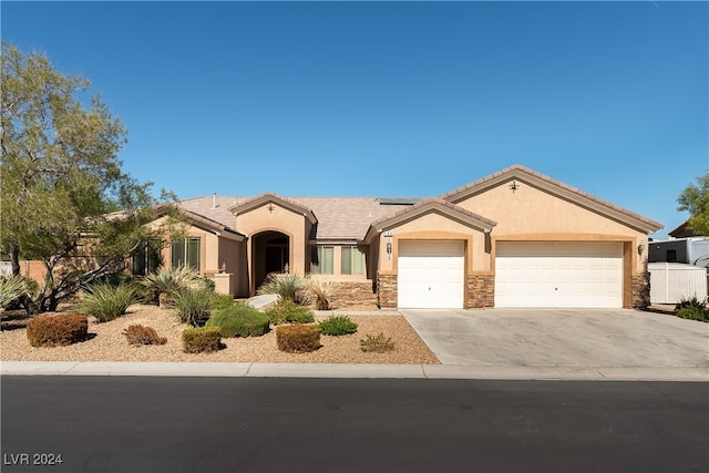 single story home with a garage