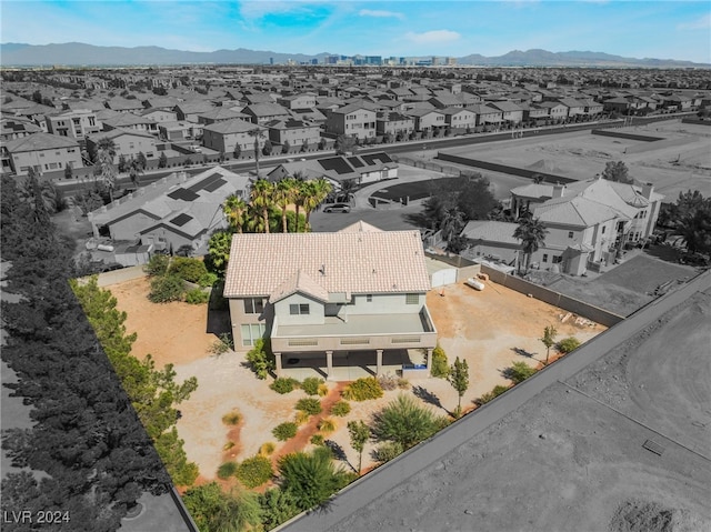 drone / aerial view featuring a mountain view