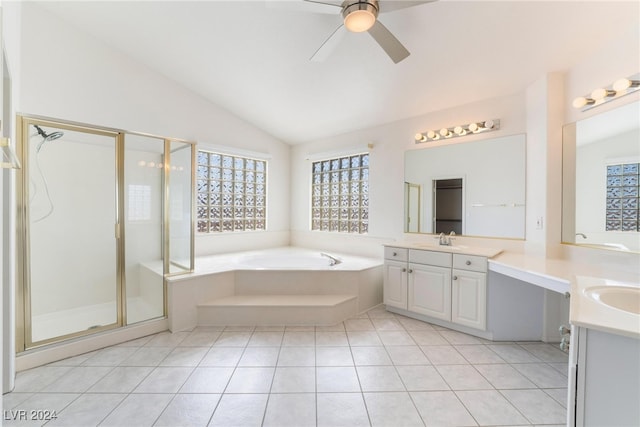 bathroom featuring independent shower and bath, vanity, lofted ceiling, and tile patterned flooring