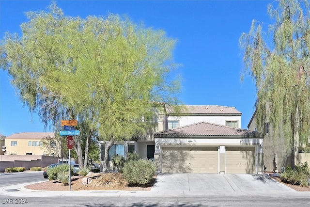 view of front of home with a garage