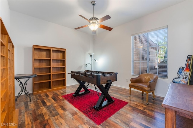 playroom featuring ceiling fan and dark hardwood / wood-style flooring