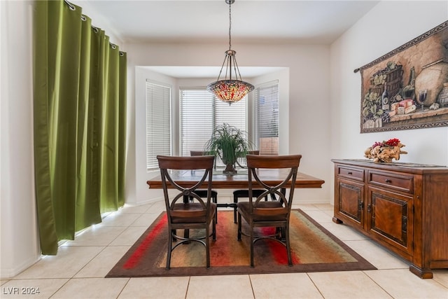 dining space with light tile patterned floors