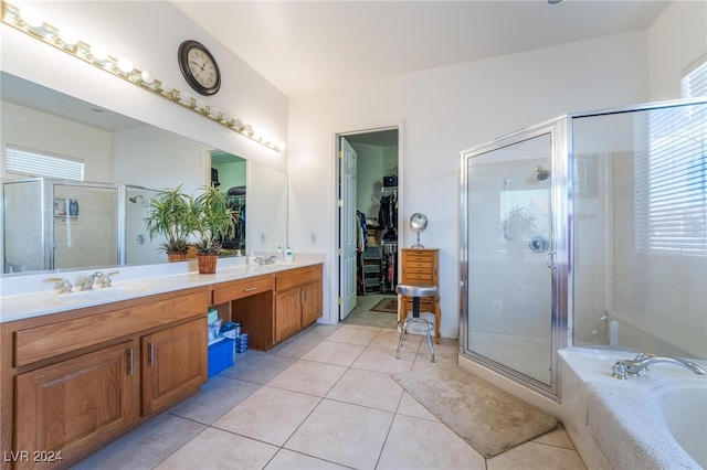 bathroom with tile patterned floors, vanity, and independent shower and bath