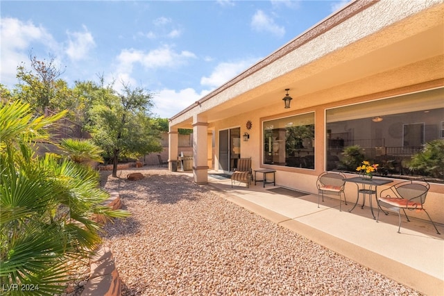 rear view of house featuring a patio area