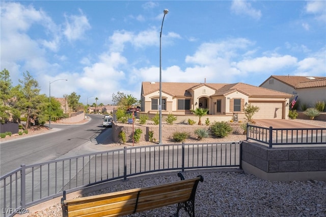 view of front of home with a garage