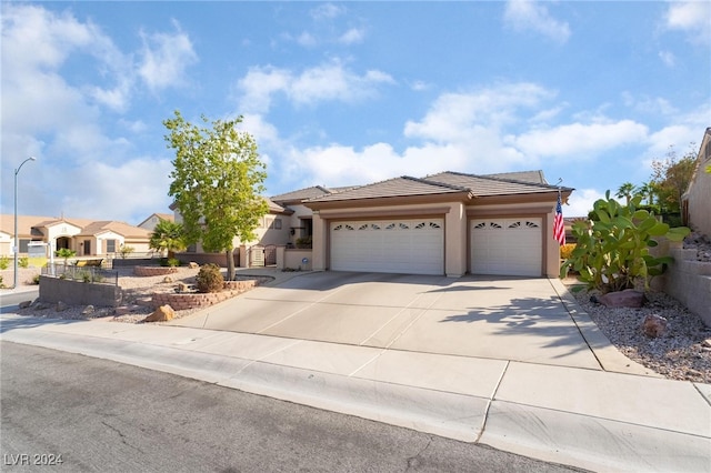 view of front of home with a garage