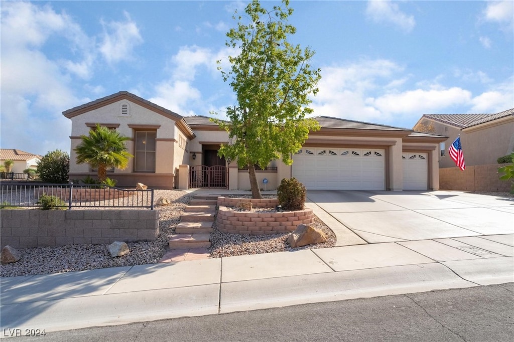 view of front of property featuring a garage