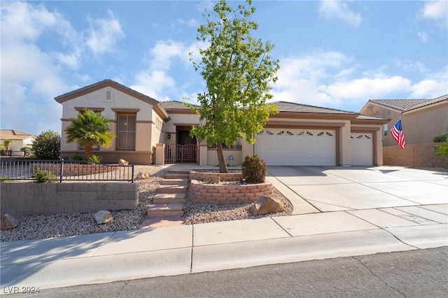 view of front of property featuring a garage