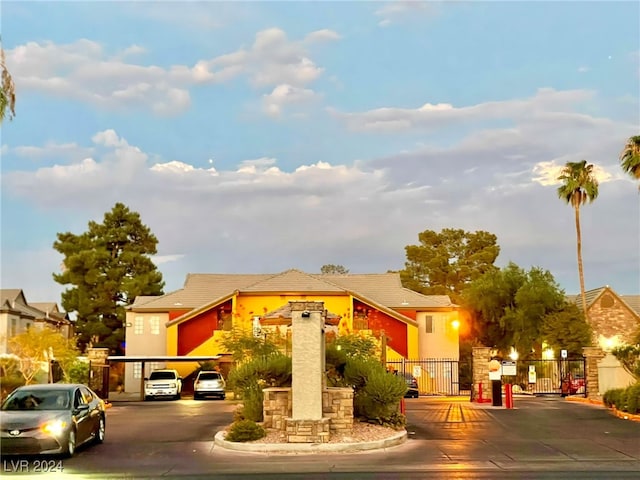 view of front of property with a carport