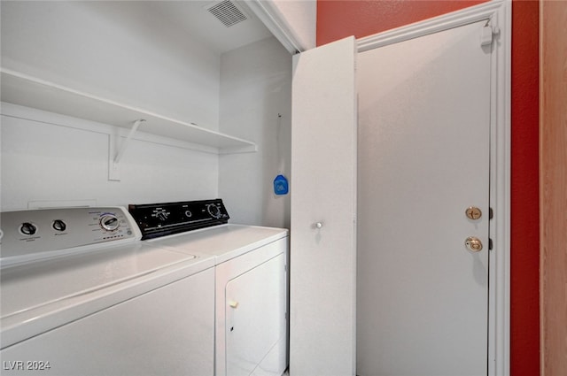 laundry room featuring independent washer and dryer