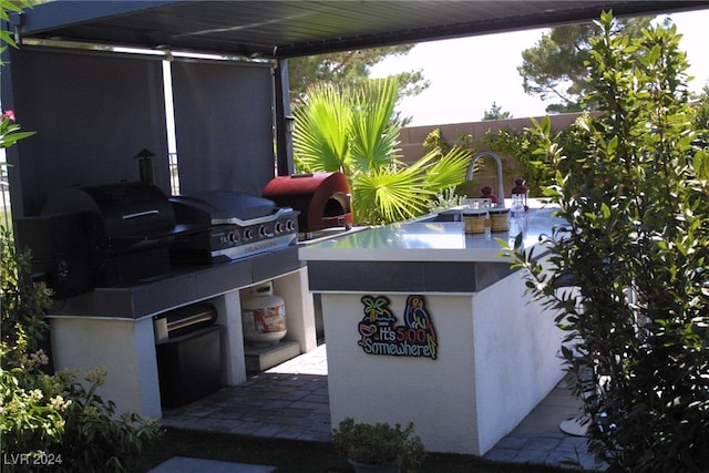 view of patio featuring area for grilling and grilling area