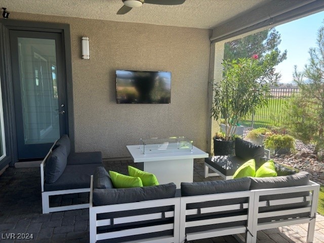 view of patio / terrace featuring an outdoor hangout area and ceiling fan