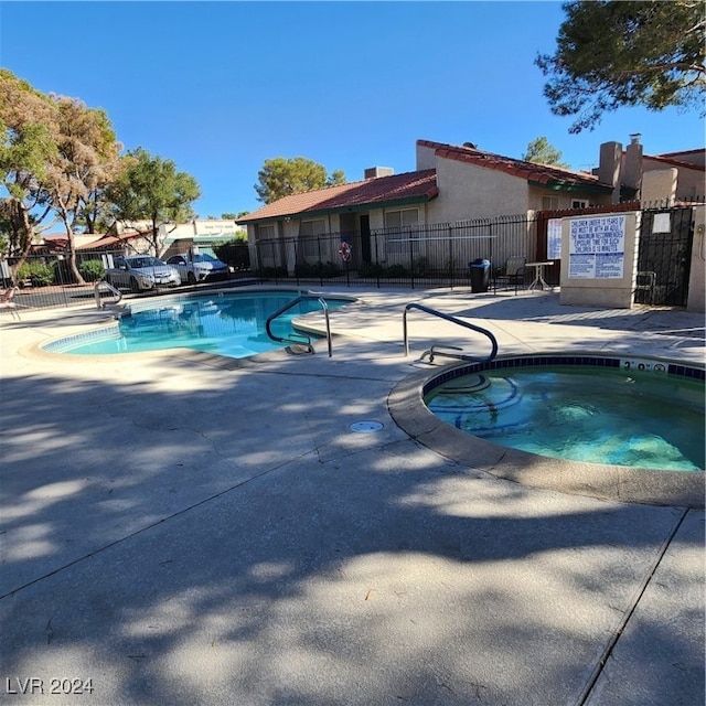 view of swimming pool with a patio area