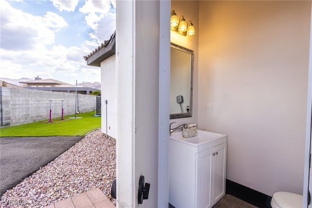 bathroom featuring sink and toilet