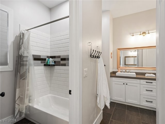 bathroom featuring vanity and shower / bathtub combination with curtain