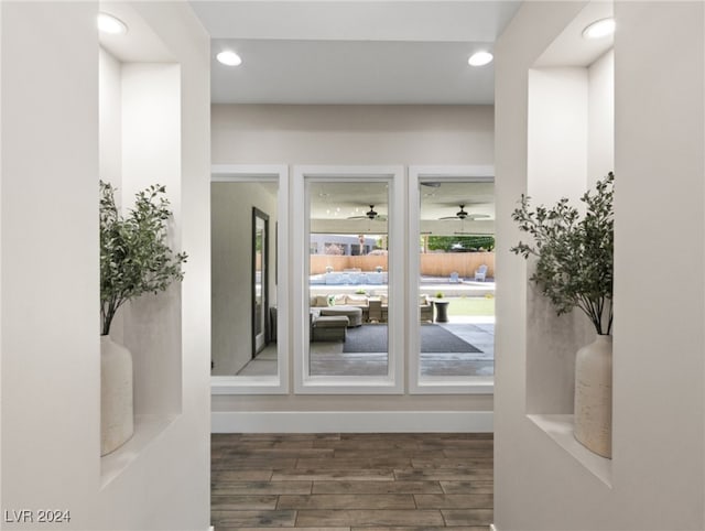 entryway featuring dark hardwood / wood-style flooring and ceiling fan