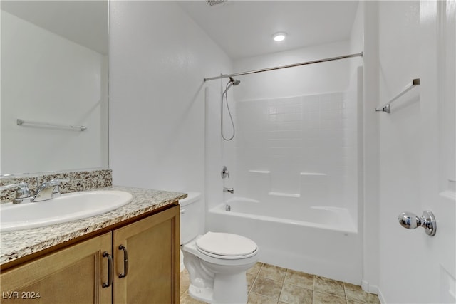 full bathroom featuring shower / bathing tub combination, vanity, tile patterned floors, and toilet